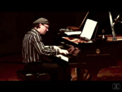 Snapshot of pianist Kristian Alexandrov in a classical jazz concert with Jens Lindemann, 2008